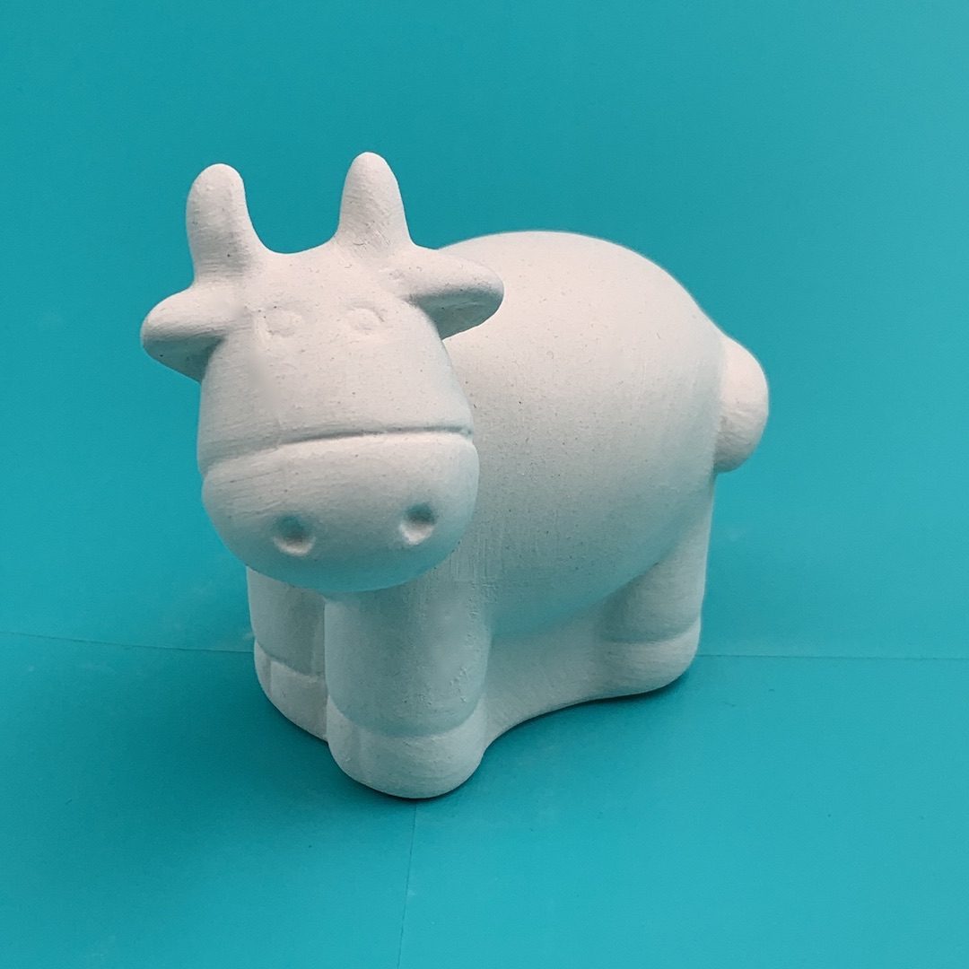 Ready-to-Paint ceramic Tiny Cow from Create Art Studio in our Toronto location and online