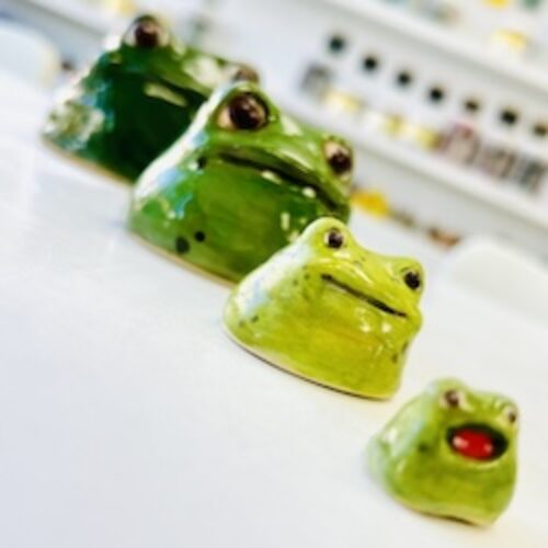 Create clay Nesting Frogs, one our cutest and most popular sculpture projects in our workshops